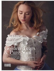 Vigour Magazine December 2020 cover featuring a fine art portrait by Massen Photography, model in a white corset with a golden tear detail