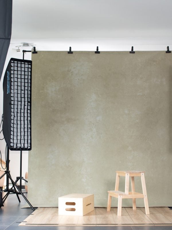 Portrait photography studio setup at Massen Photography with Broncolor lighting and neutral backdrop.
